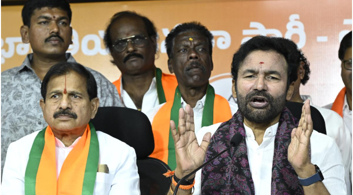 G. Kishan Reddy speaking at a BJP event, calling for a 'double-engine government' to restore financial stability and corruption-free governance in Telangana.