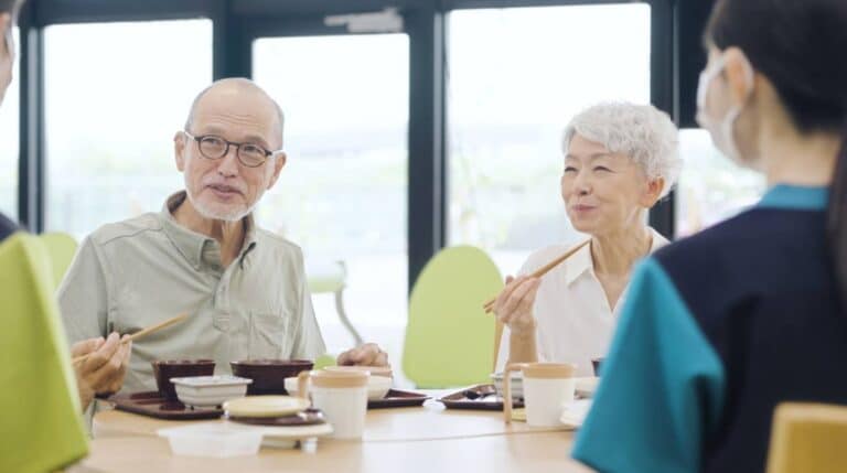 Elderly patient undergoing a dental checkup highlighting the link between oral health and longevity
